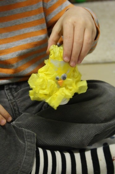 toddler holding toilet roll chick