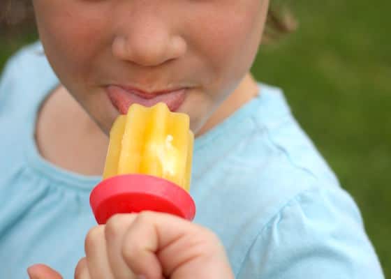 girl eating homemade creamsicle