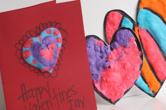 Homemade Valentines card and 2 cardboard hearts made with homemade puffy paint