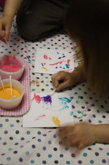 kids painting with homemade puffy paint