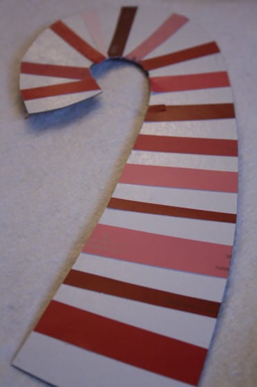 candy cane made from cardboard and red and pink paint chips