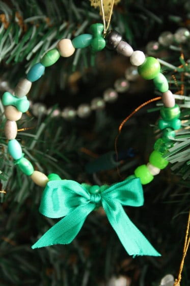 green bead wreath with green ribbon 