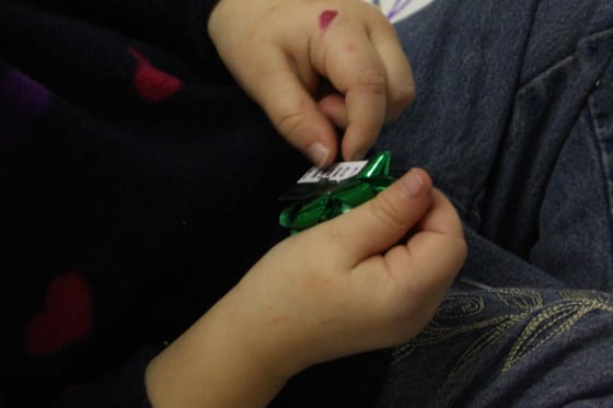 peeling the bow for foil wrapped ornaments