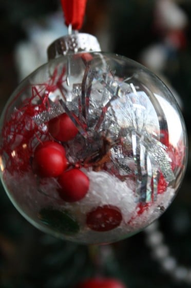 Simple Clear Glass Christmas Ornament filled by Toddler