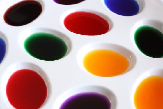 tray of homemade liquid watercolor paints