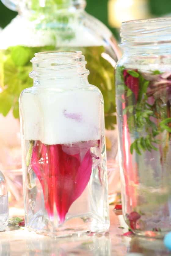 jars and bottles filled with perfume that the kids made