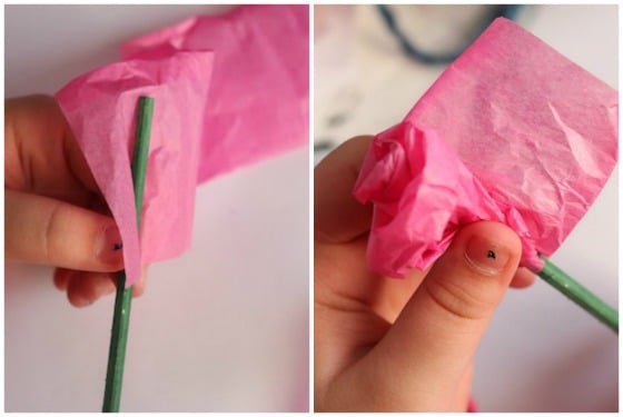 Kid making tissue paper rose