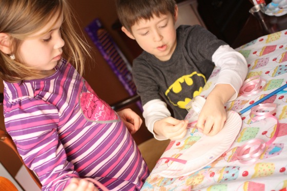 Kids making paper plate crafts