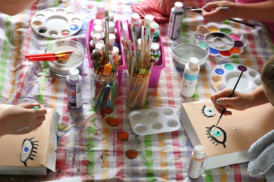 Kids painting cereal boxxes