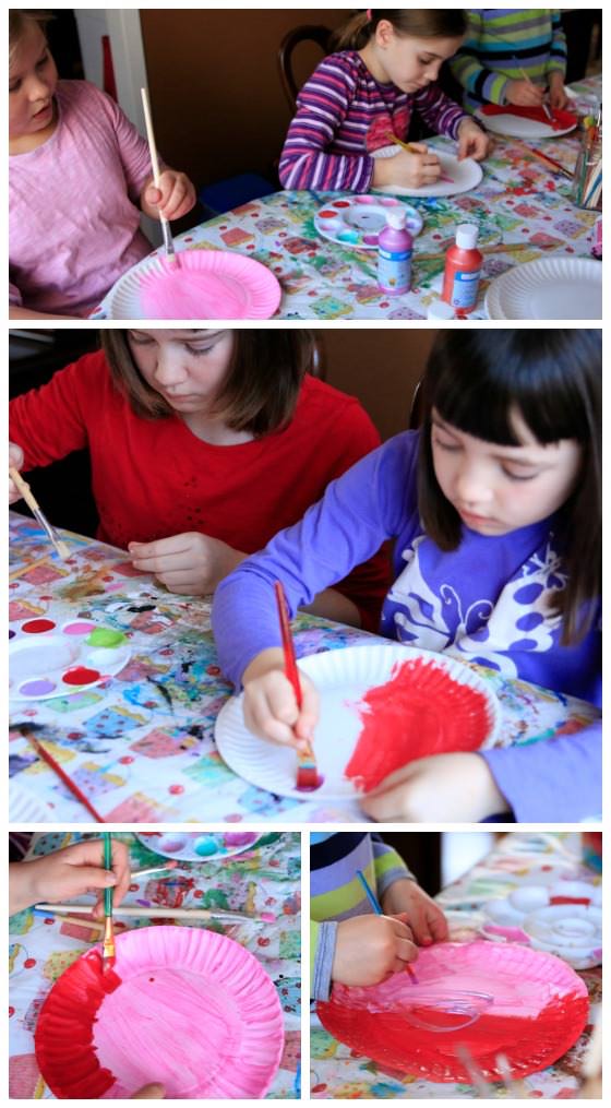 Kids painting paper plates for Valentines Craft