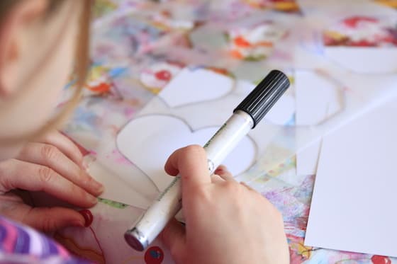 Preschooler tracing a heart