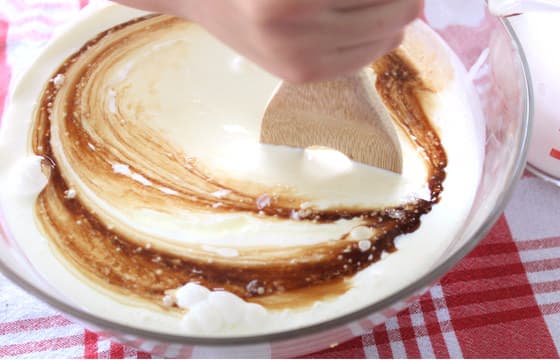 stirring vanilla into heavy cream