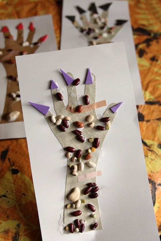 monster hand craft with lentils and bandaids