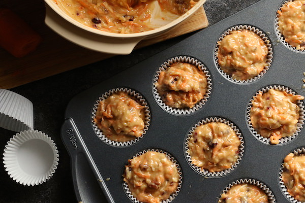 morning glory muffin batter in muffin tin 