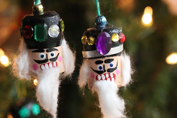 champagne cork nutcrackers heads ornaments on Christmas tree