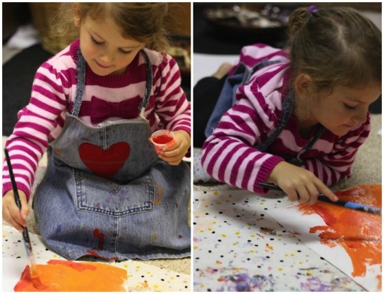 preschooler Painting Pumpkins - a lesson in colour mixing