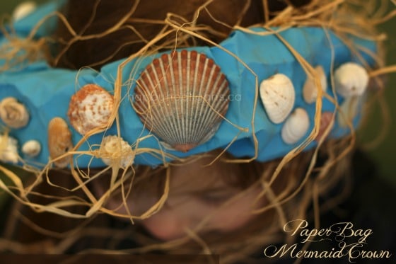 paper bag mermaid crown on girl's head