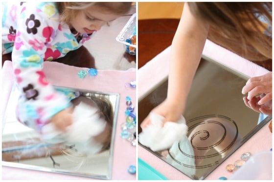 wiping dry erase marker drawing off glass mirror