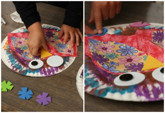 gluing beaks and feet to paper plate owl