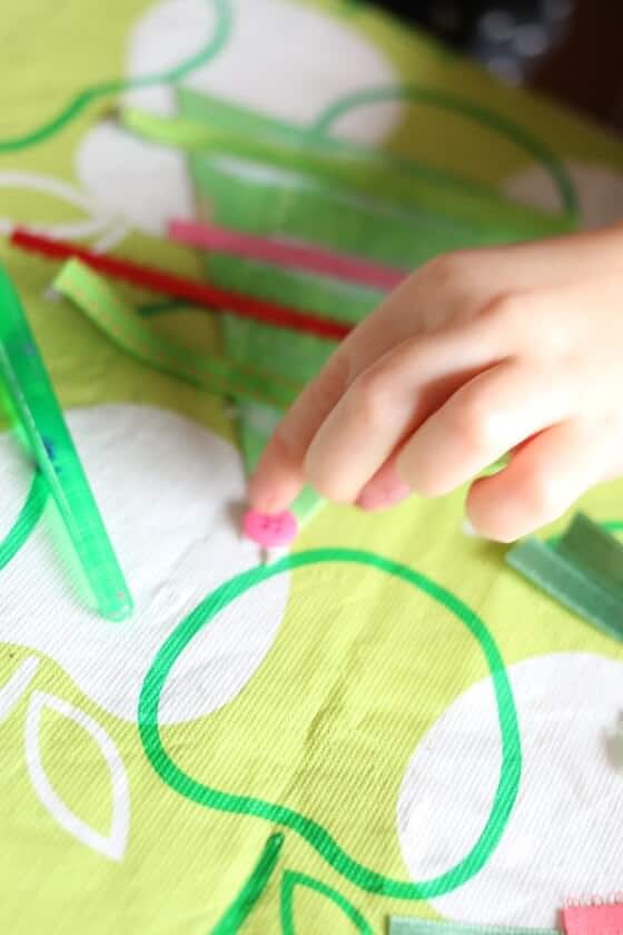 Gluing button on Christmas Tree ornament