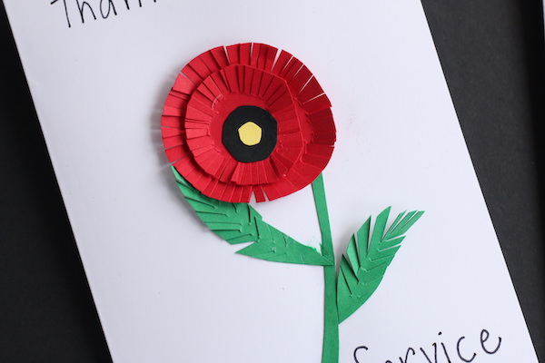 paper circle poppy with fringed edges on petals and leaves