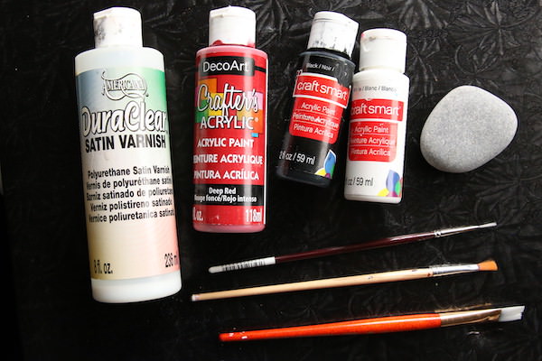 Supplies for Poppy Rocks - paint, brushes, smooth beach stone