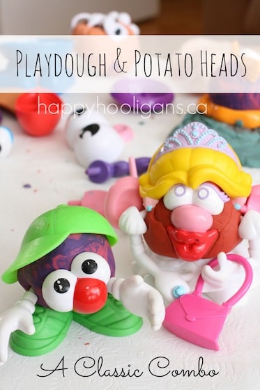 Mrs. Potato Head and son made of homemade play dough and potato head parts.