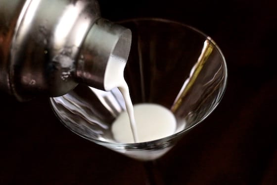 Pouring Key Lime Pie Martini into Martini Glass