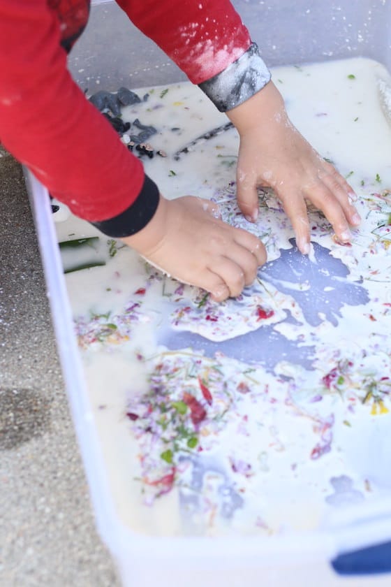 preschooler with nature goop