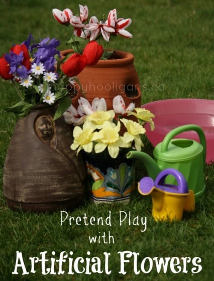 toddler and preschooler pretend play with artificial flowers 