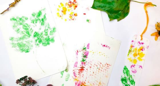 prints made by stamping flowers and leaves