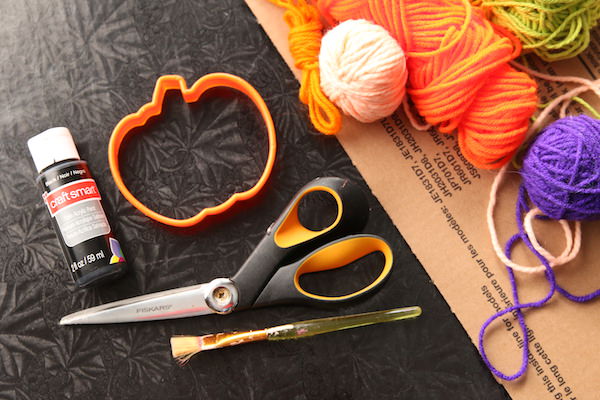 supplies for making cardboard pumpkin string art 
