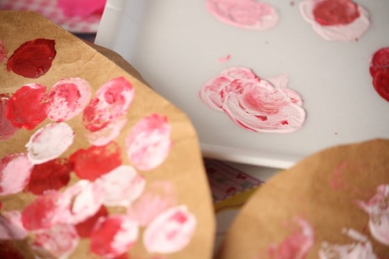 red and pink paint and paper bag hearts