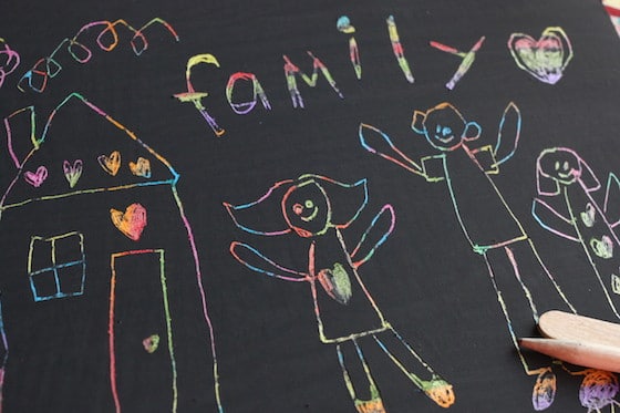 scratch art family portrait drawn by child