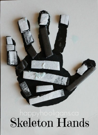 skeleton hand print art for halloween