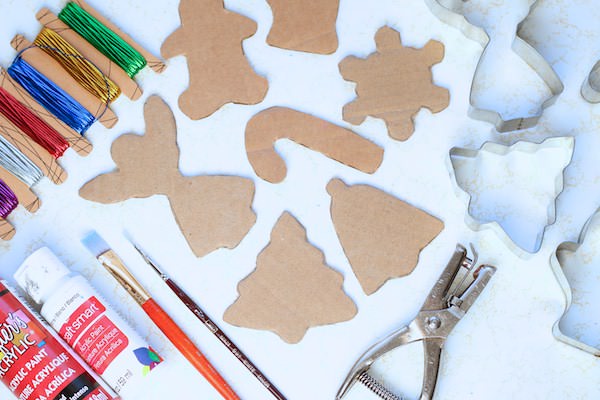 christmas cookie cutters, cardboard shapes, red and white paint, 