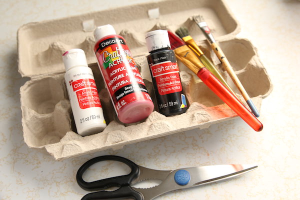 egg carton, red and black paint, paintbrushes, scissors