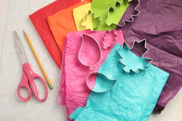 tissue paper, leaf cookie cutters, scissors