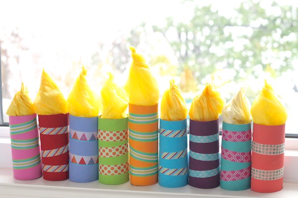 tp roll menorah with washi tape on windowsill