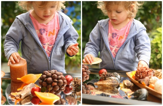 toddler exploring Fall Sensory Table