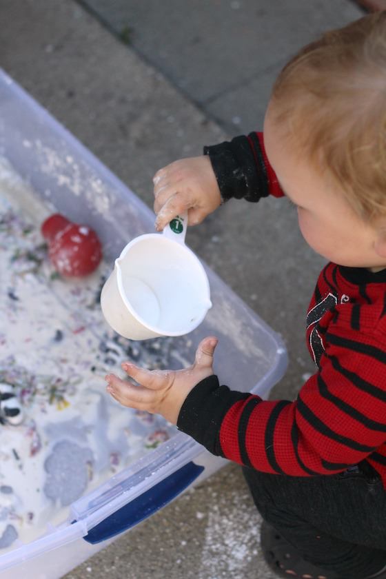 toddler playing with goop