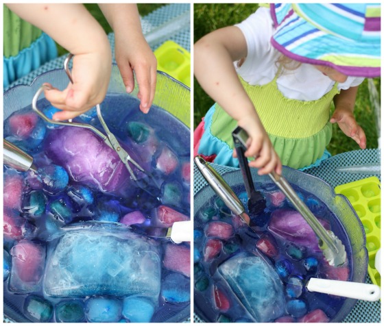 toddler using tongs to scoop coloured ice