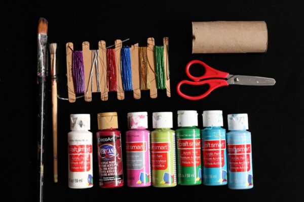 acrylic craft paint, toilet paper roll, paint brushes and scissors