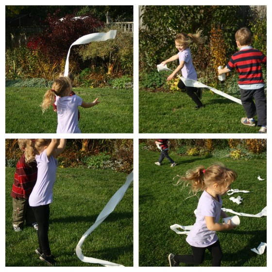 kids running in the yard, unravelling roll of toilet paper