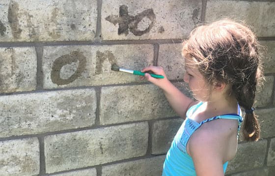 Water Painting- sight words on a wall