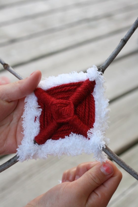 wrapping sticks with red and white yarn for Canada Day ornament